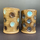 pair of cups with circles