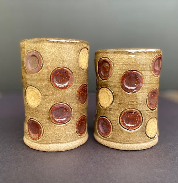 pair of cups with circles