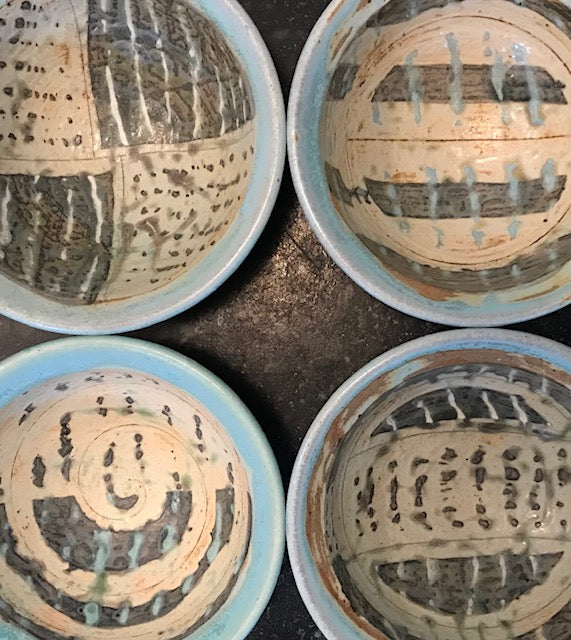 set of small bowls with slip design