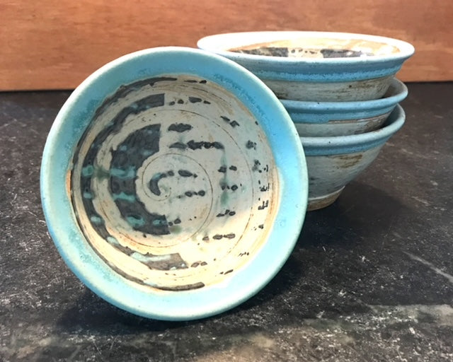 set of small bowls with slip design