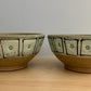 pair of small bowls with squares