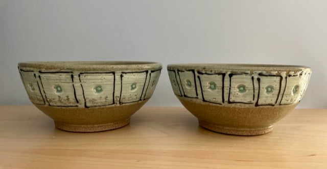 pair of small bowls with squares