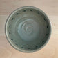 pair of small bowls with squares
