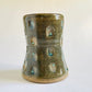 cup with turquoise slip dots