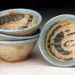 set of small bowls with slip design